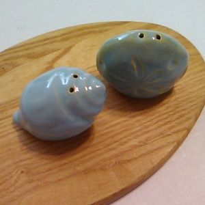 Shell salt and pepper shakers set.
